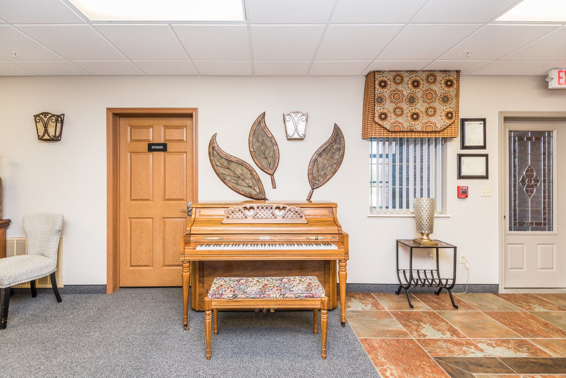 There is a piano in the middle of the room.