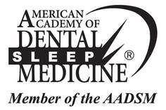 The logo for the american academy of dental sleep medicine is black and white.