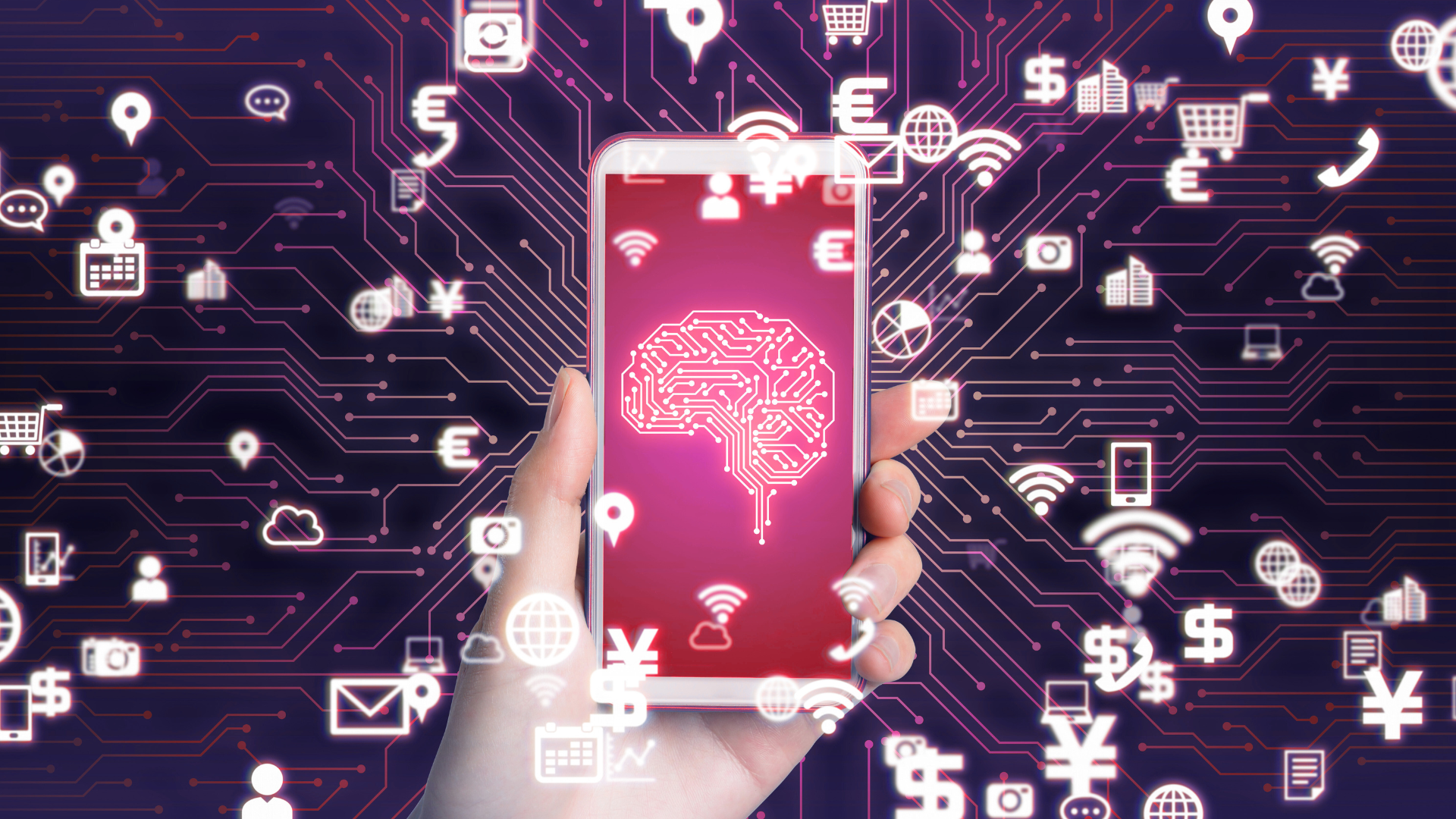 A hand is holding a cell phone with a brain on the screen.