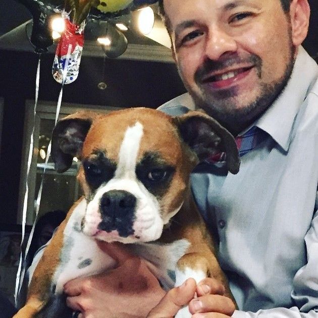 Attorney Guerra and his dog, Buddy Guerra