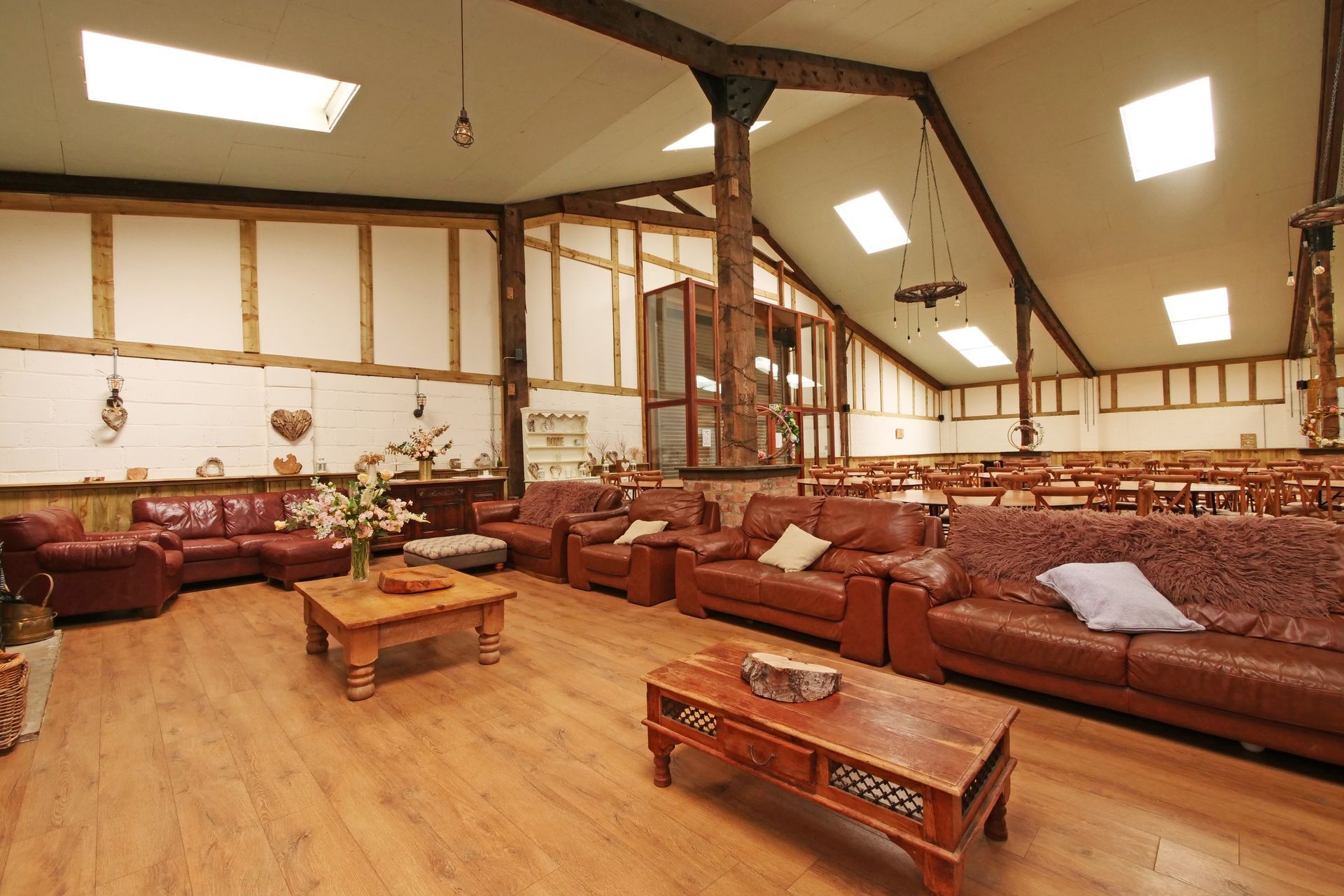 A living room with a lot of furniture and a coffee table