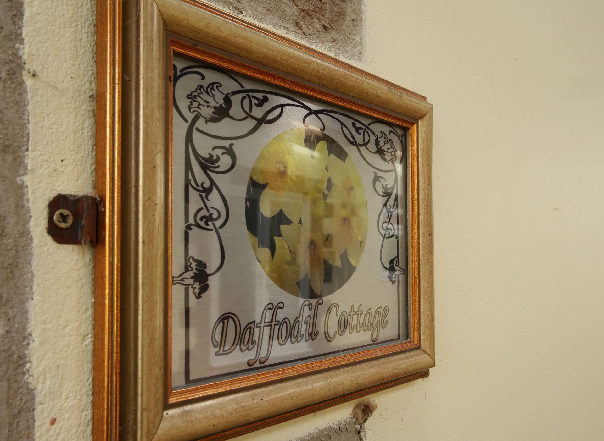 A picture frame with a picture of a globe on it