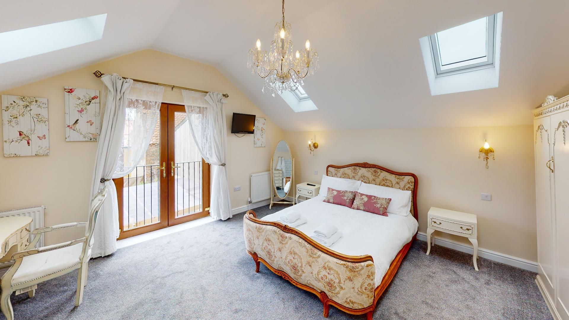 There is a large bed in the middle of the room.