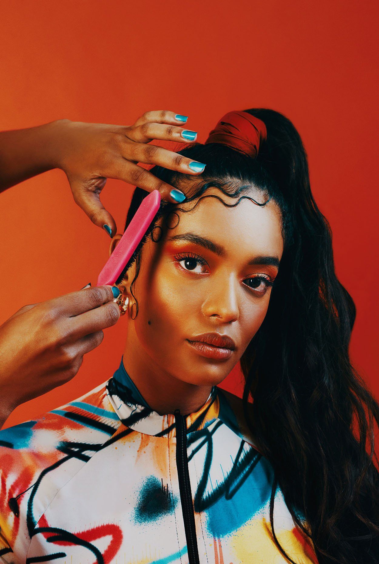 Hairstylist doing a woman's edges — New Carrollton, MD — Hair Academy