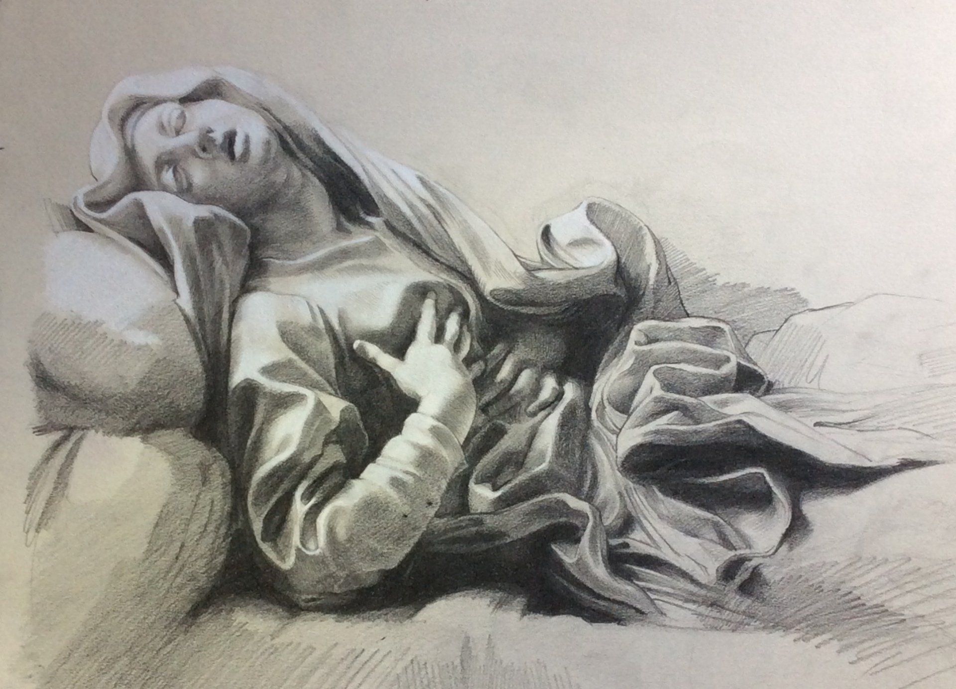 A drawing of a woman laying down with her eyes closed