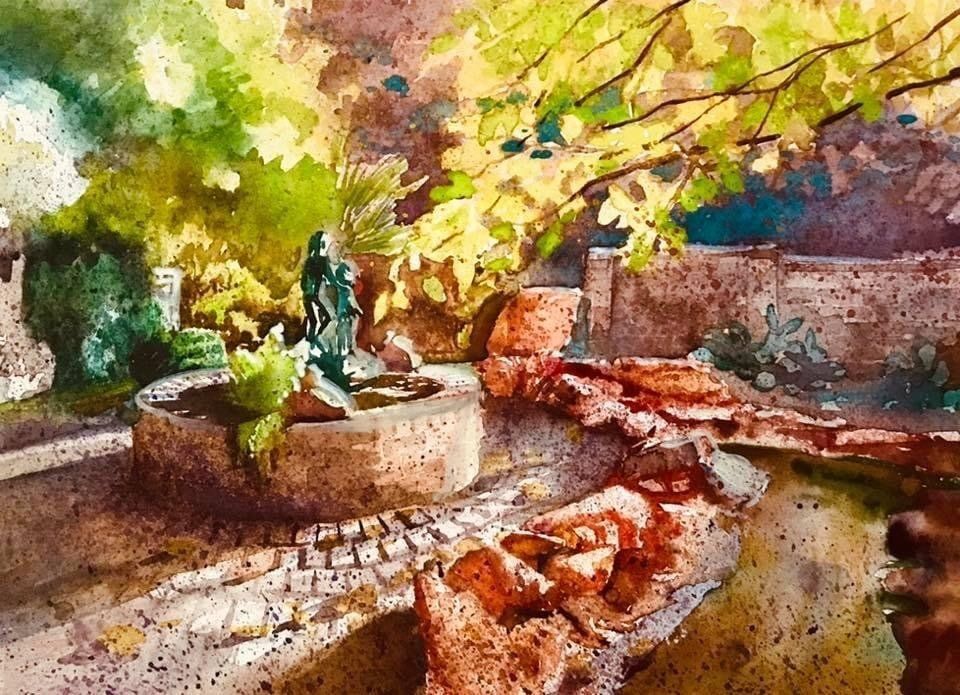 A watercolor painting of a fountain in a park