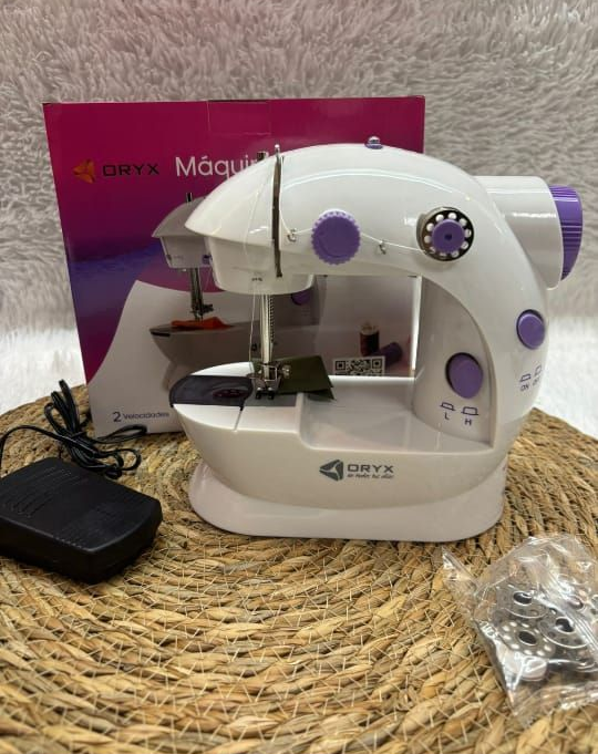 Máquina de coser portátil ORYX