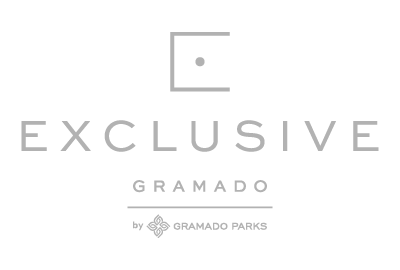 A logo for exclusive gramado by gramado parks