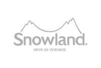 Um logotipo de snowland com uma montanha ao fundo