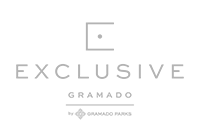 É um logotipo de uma empresa chamada Exclusive Gramado.
