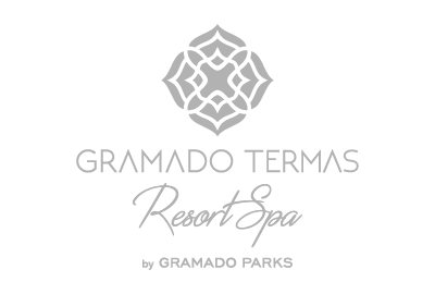 A logo for gramado termas resort spa by gramado parks