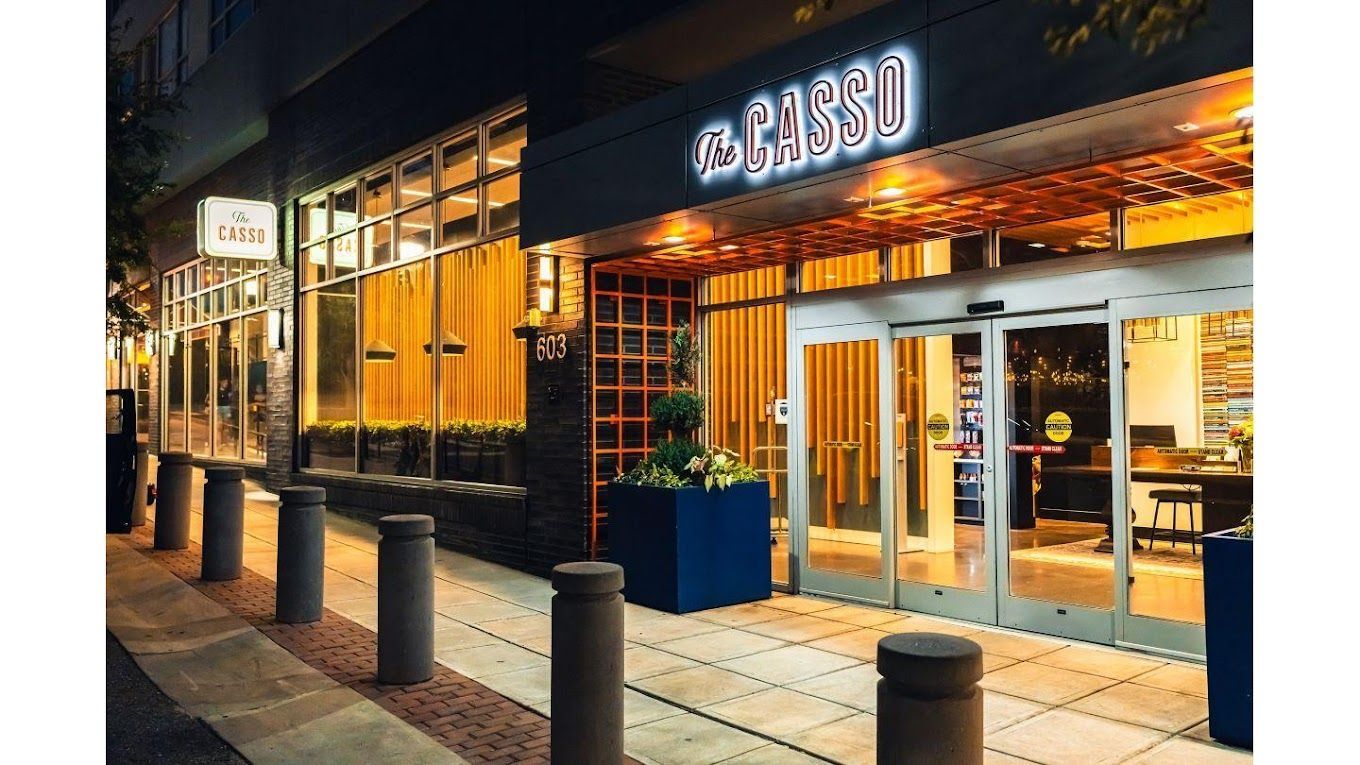 A large building with a sign that says ' a ' on it