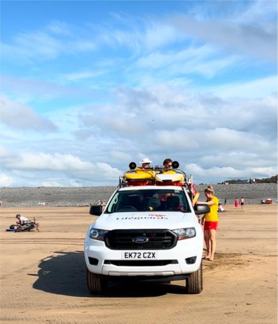 RNLI Beach Lifeguards on patrol at Westward Ho! beach in North Devon make the beach a lot safer, especially for little kids.