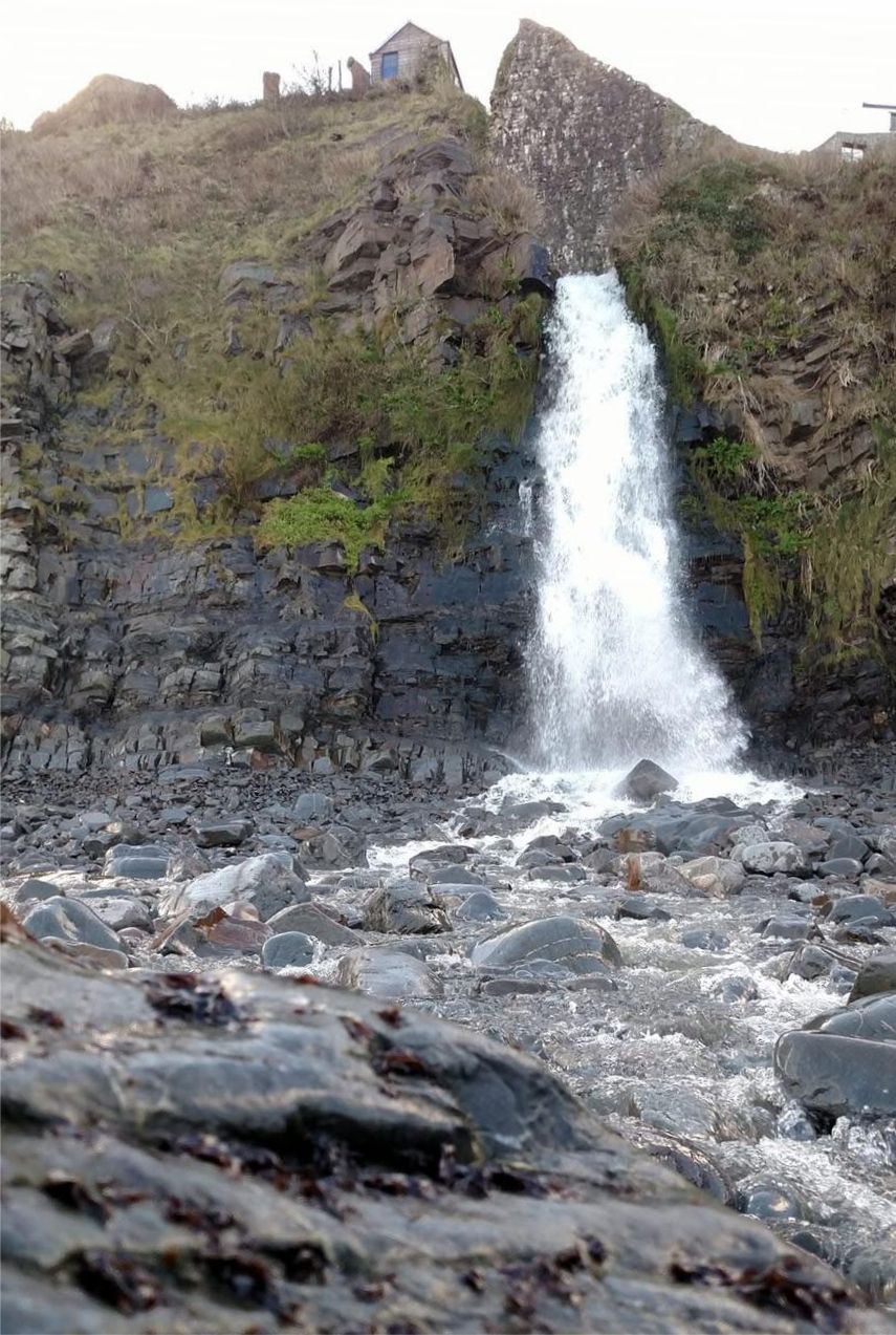 The waterfall at Bucks Mills is wonderful, cascades over the cliff onto the beach in North Devon