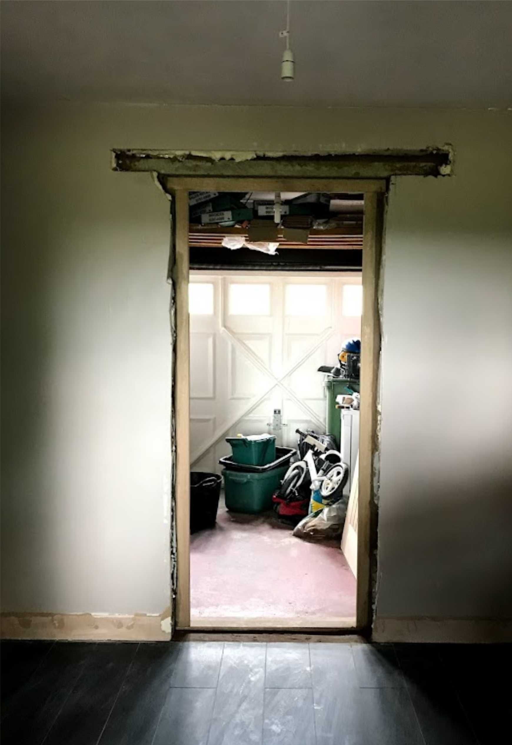 Cut out the opening, fitted a lintel, fitted door lining kit before installing a new front door with security locks and making good