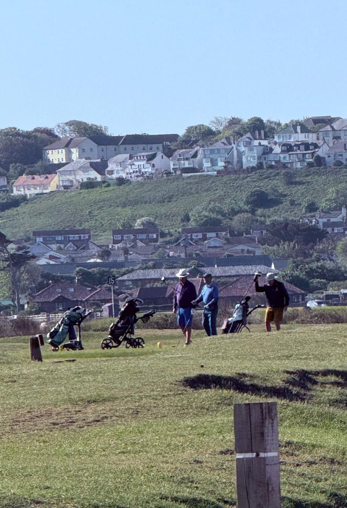 The club house at royal north devon golf course. It features stunning coastal views and challenging links, embodying a rich golfing heritage. This iconic destination blends tradition with natural beauty, offering a unique experience for golf enthusiasts