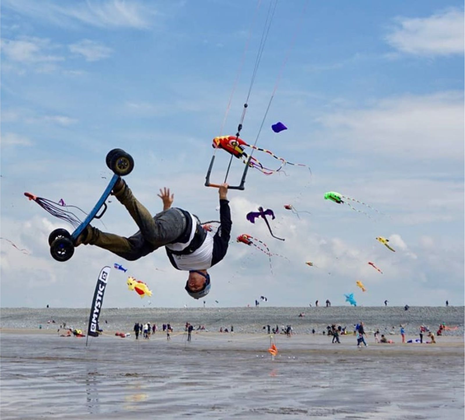 flying a stunt kite at Westward Ho! beach, UK
