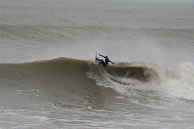 Big wave in Westward Ho! devon being surfed