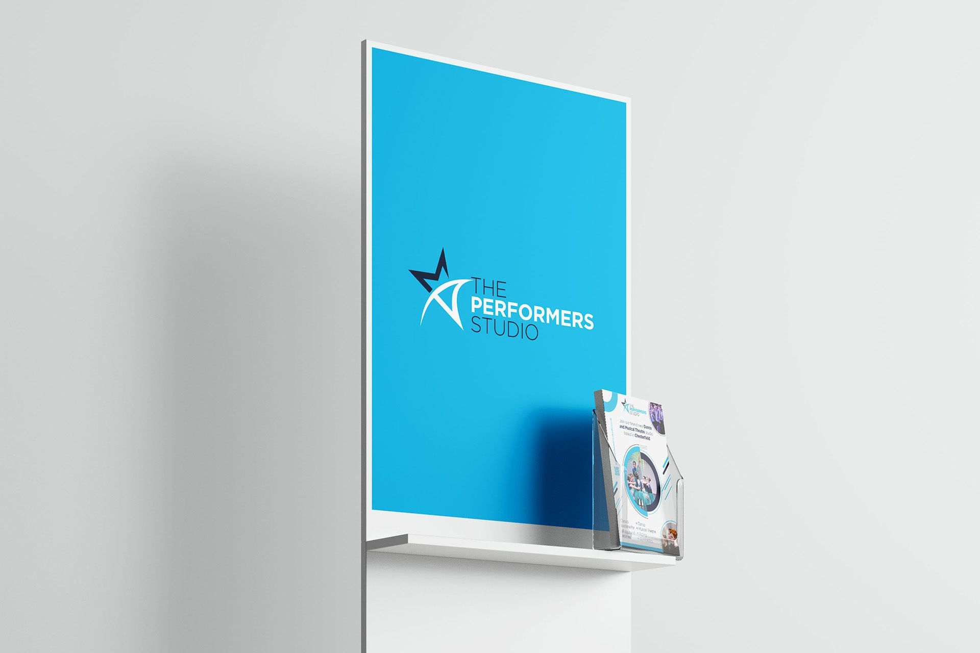 White display stand with a blue poster and a brochure holder; logo visible.
