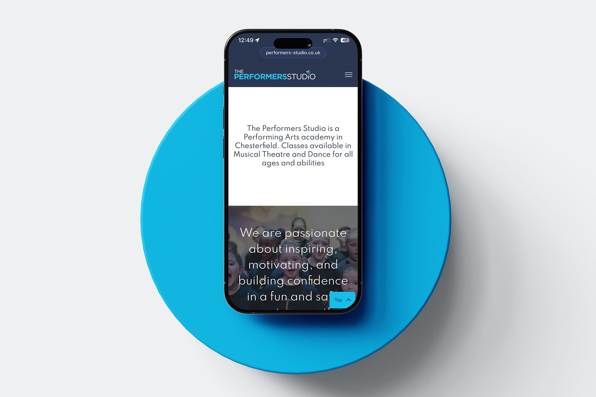 Smartphone displaying a website with text and graphics on a blue circle.