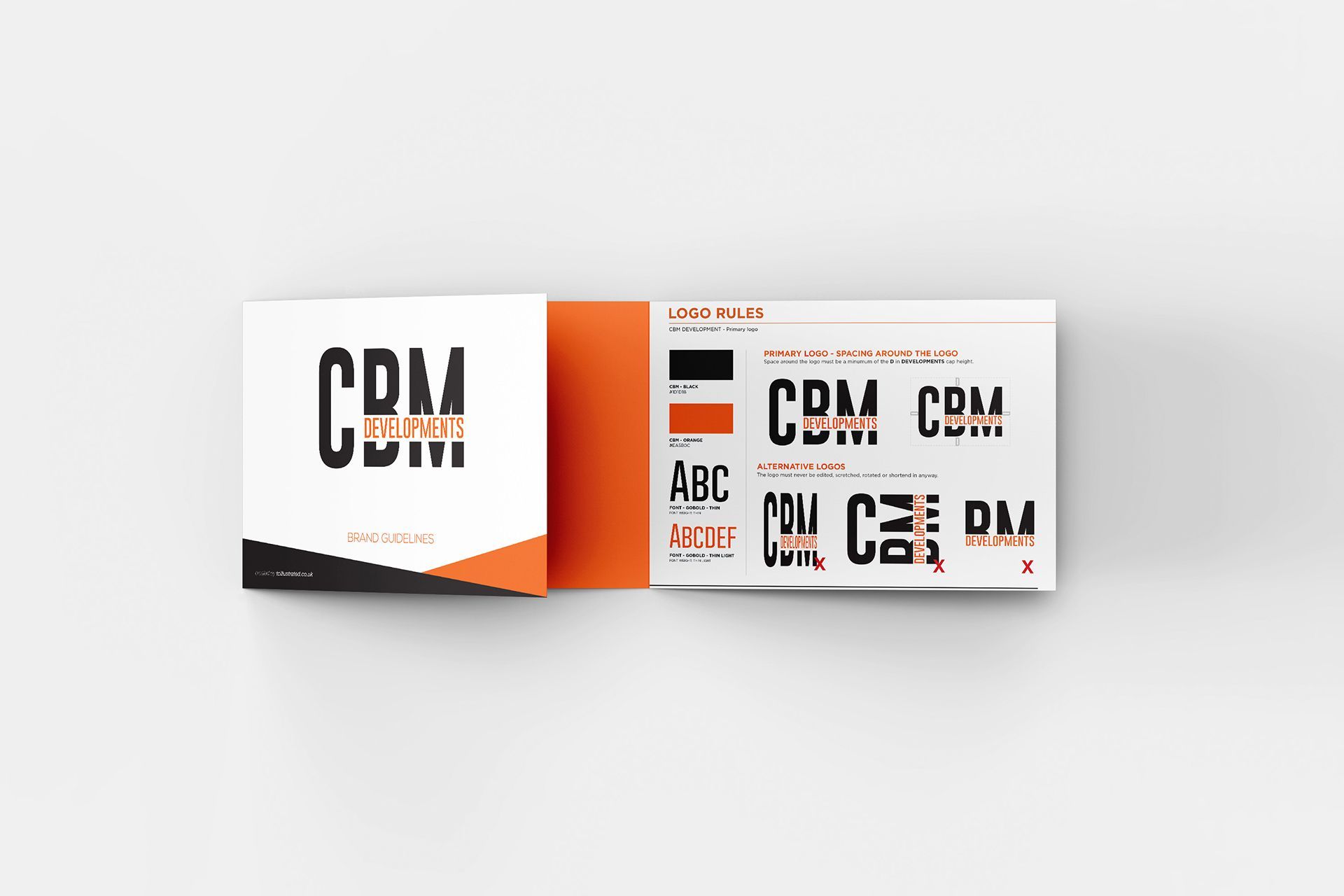 Brand style guide book opened to reveal 