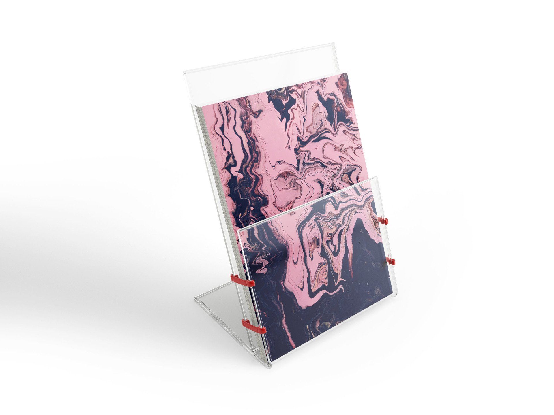 Clear acrylic brochure holder displaying two brochures with pink and dark blue marble patterns.
