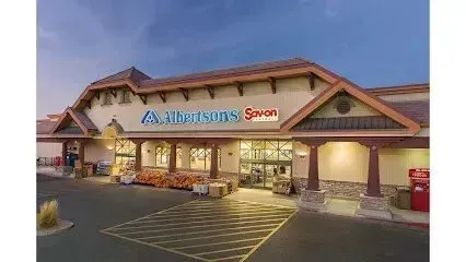 Tree Services West Covina - Albertson's Sav-On grocery store exterior at dusk.
