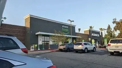 Tree Services West Covina – The parking lot of Amazon Fresh and Kohl’s in West Covina is surrounded by well-maintained trees that enhance the urban landscape.