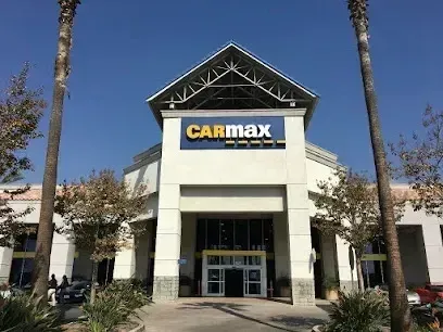 Tree Services West Covina ensures that commercial properties like CarMax maintain a clean and professional appearance with well-maintained landscaping.