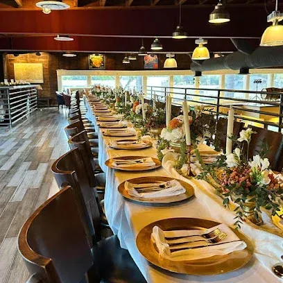Tree Services West Covina – This beautifully arranged dining setup at Chase's La Verne showcases a warm and inviting atmosphere with elegant table settings, floral arrangements, and soft candle lighting.