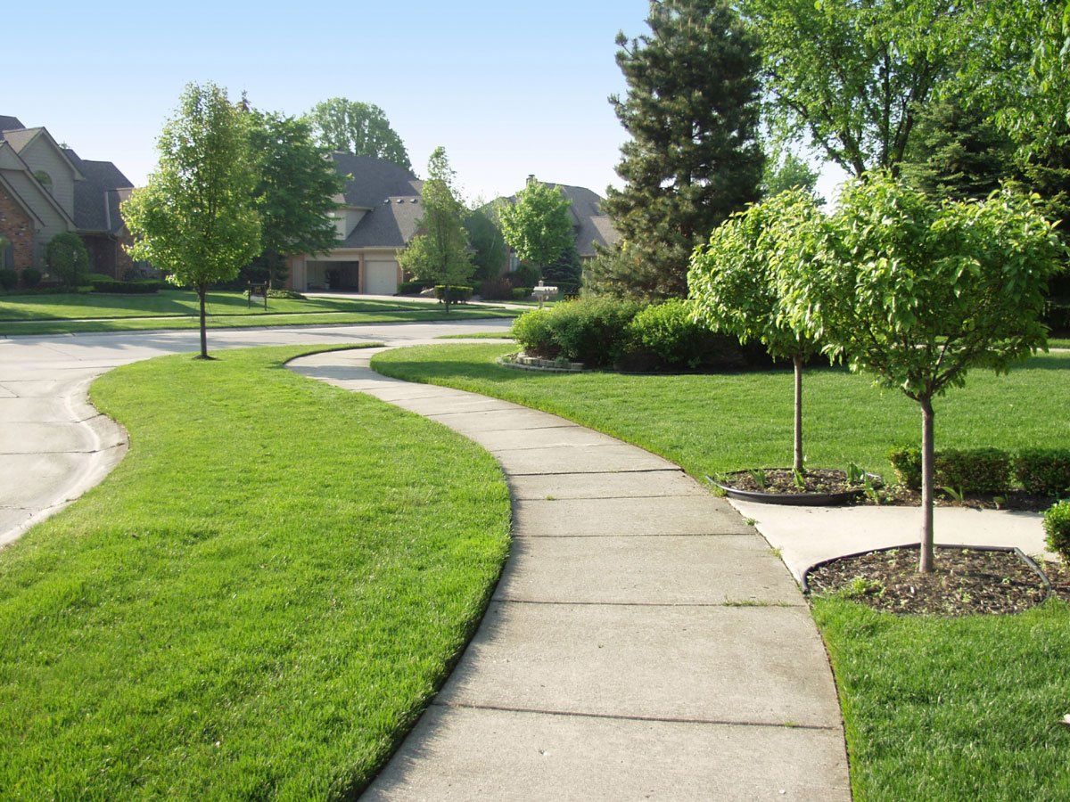 Suburban Sidewalk — Hayward, WI — Schobert’s Painting & Decorating LLC