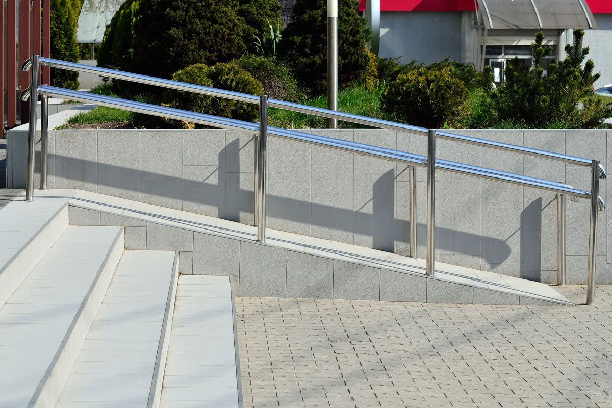 Ramp for Wheelchair Entry with Metal Handrails — Hayward, WI — Schobert’s Painting & Decorating LLC