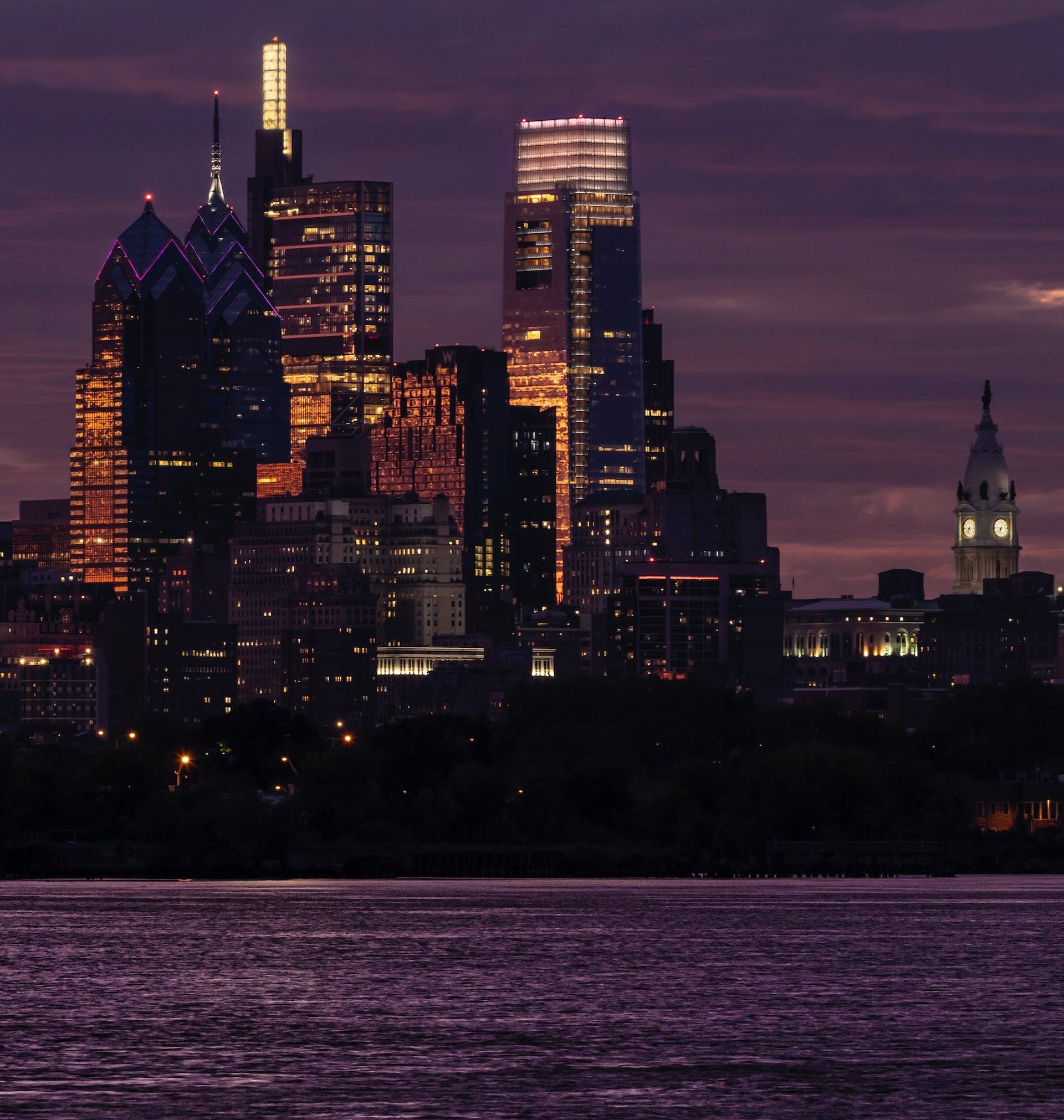 The skyline of philadelphia is lit up at night