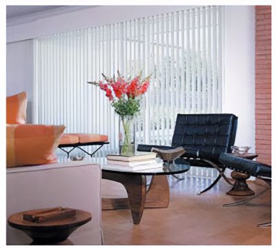 Love is Blinds St. Louis: A living room with a table and chairs and vertical blinds