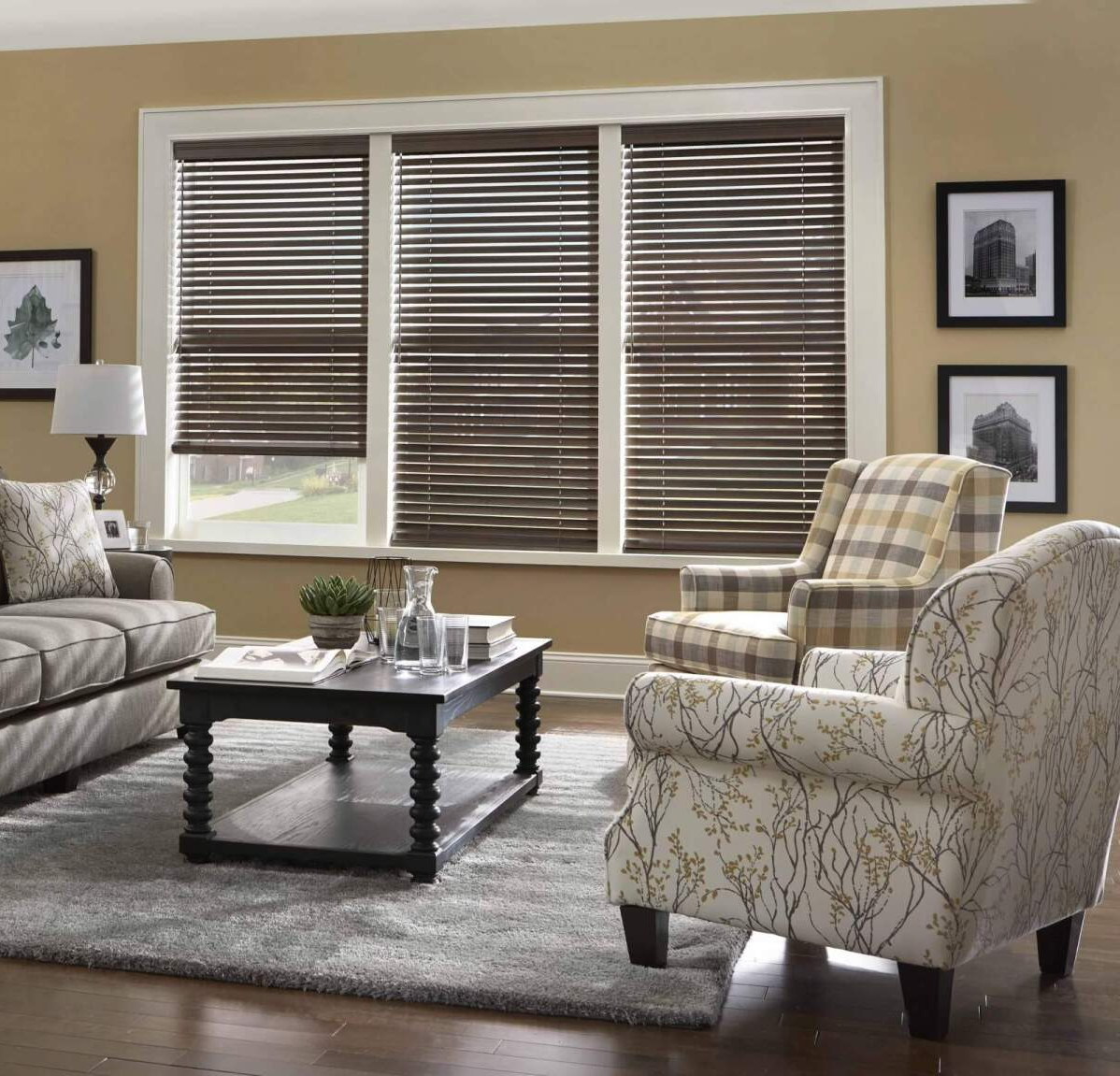Love is Blinds MO: A living room with a couch , chairs , coffee table and blinds