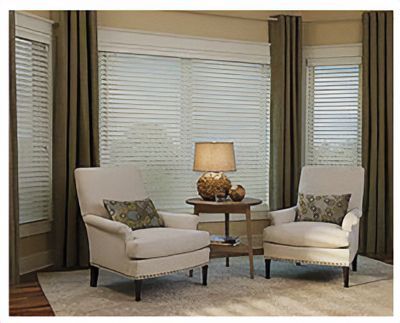 Love is Blinds St. Louis: A living room with two chairs , showing windows with blinds. 