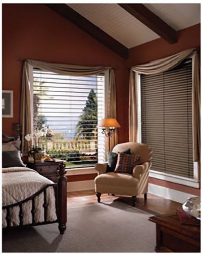 Love is Blinds St. Louis: A bedroom with a bed , chair and window with blinds