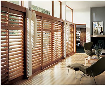 Love is Blinds St. Louis: A living room with wooden blinds on the windows