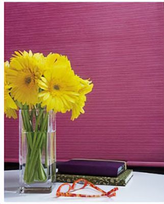 Love is Blinds St. Louis: A vase of yellow flowers sits on a table in front of purple blinds.