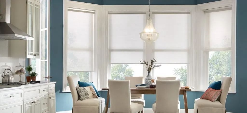 Motorized roller shades by Alta is the Kitchen. 