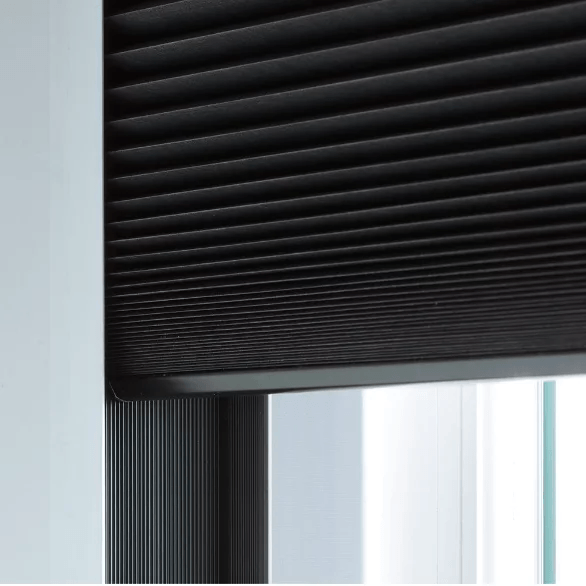 a close up of a black hunter douglas blind on a window Love is Blinds Missouri (314) 808-3440.