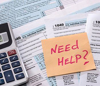 Tax Preparation — Calculator and Papers in Schererville, IN