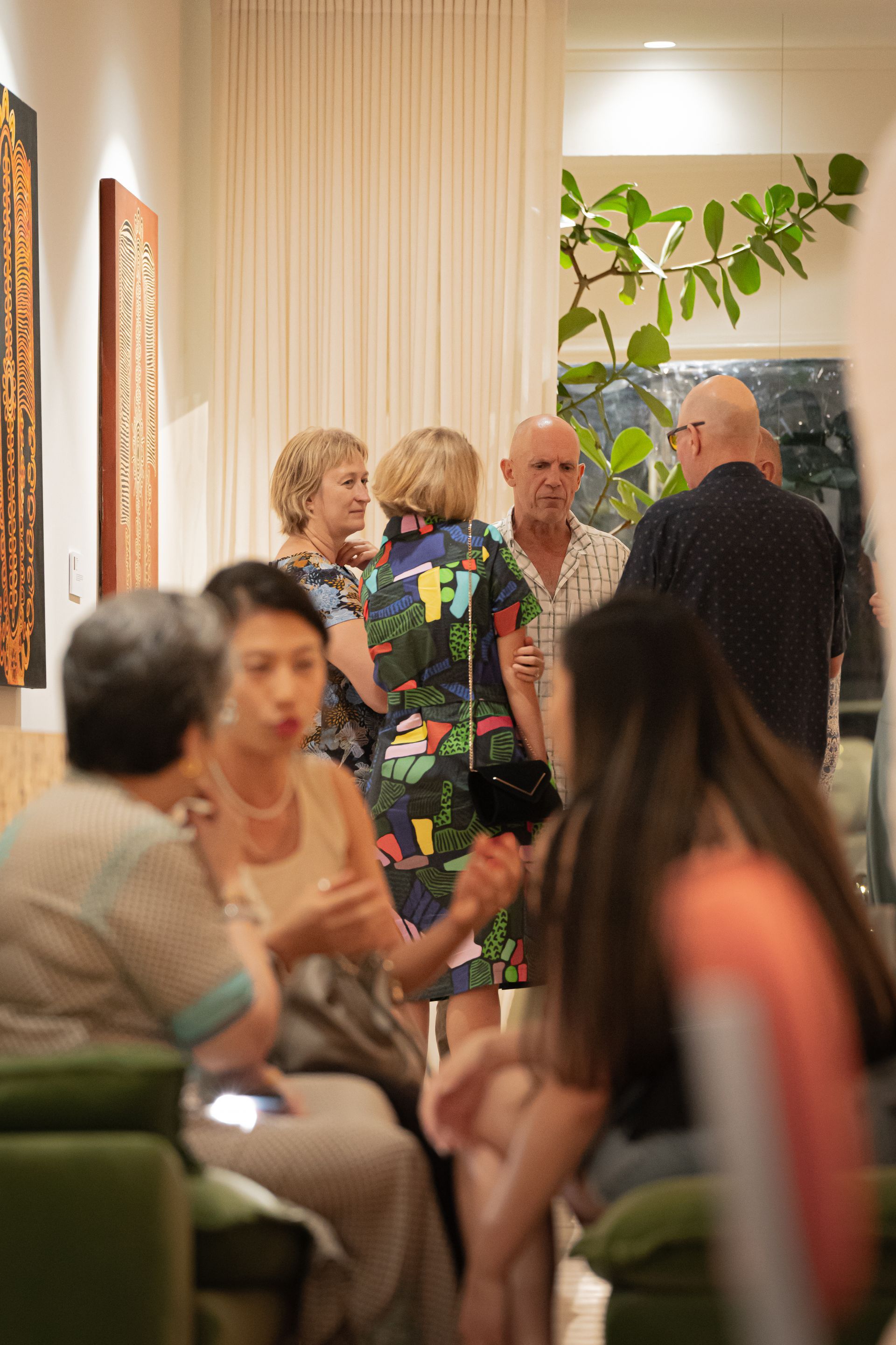 Guests interacting at Studio 29 Cairns during exhibition event