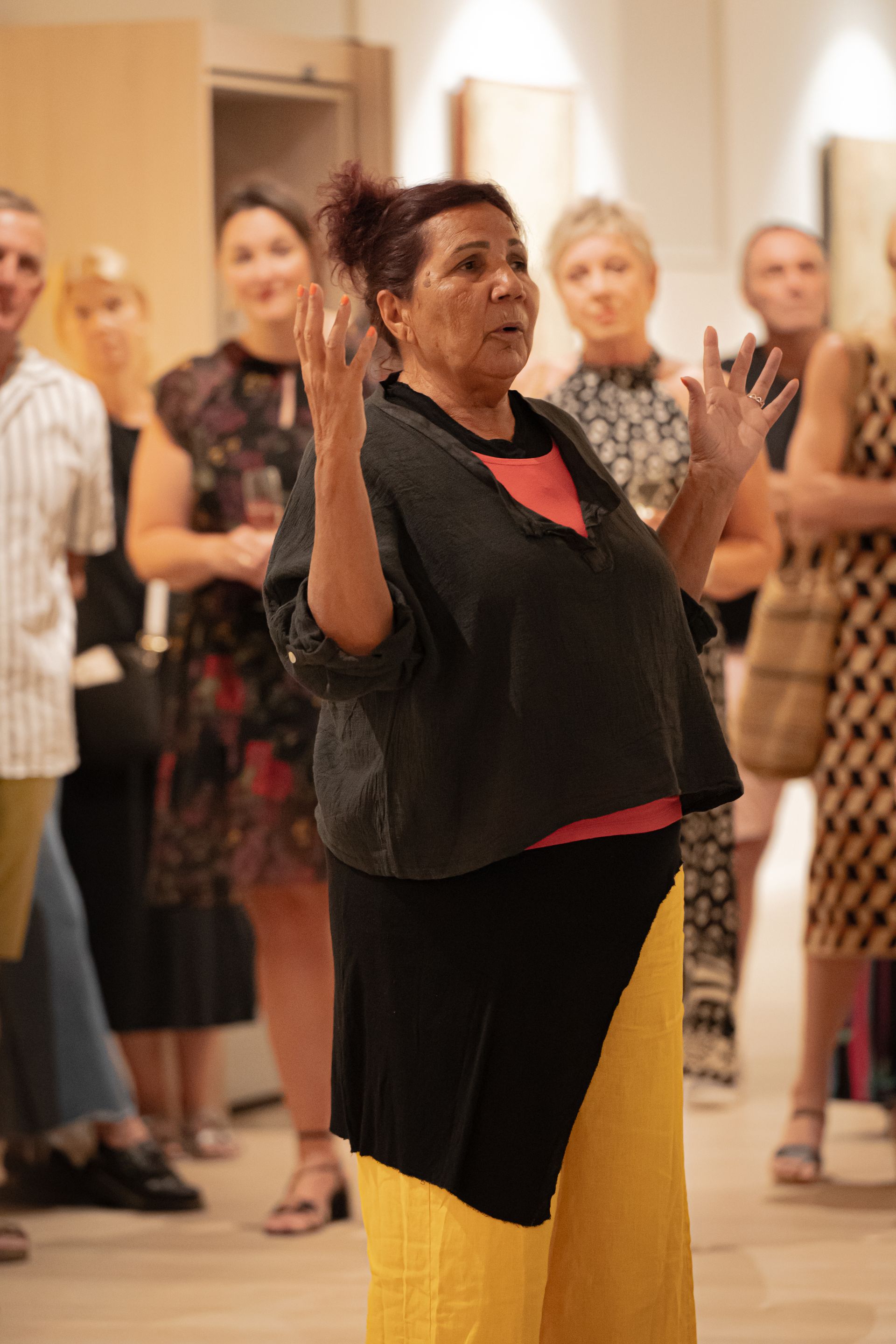 Alison Nampitjinpa Anderson at Flourishing exhibition Studio 29 Cairns event space