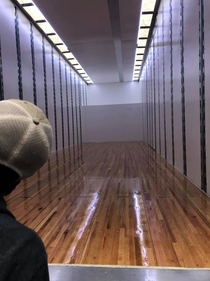 inside of jr brown truck with polished floors and lighting