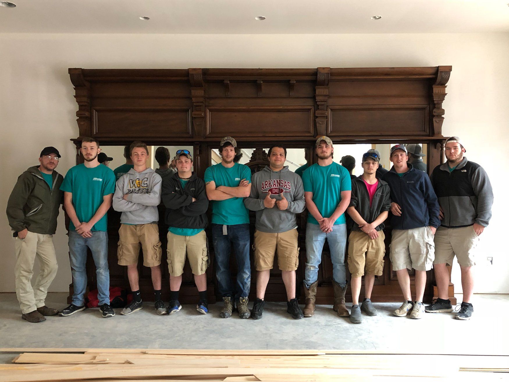 jr brown employees proudly posing for photo