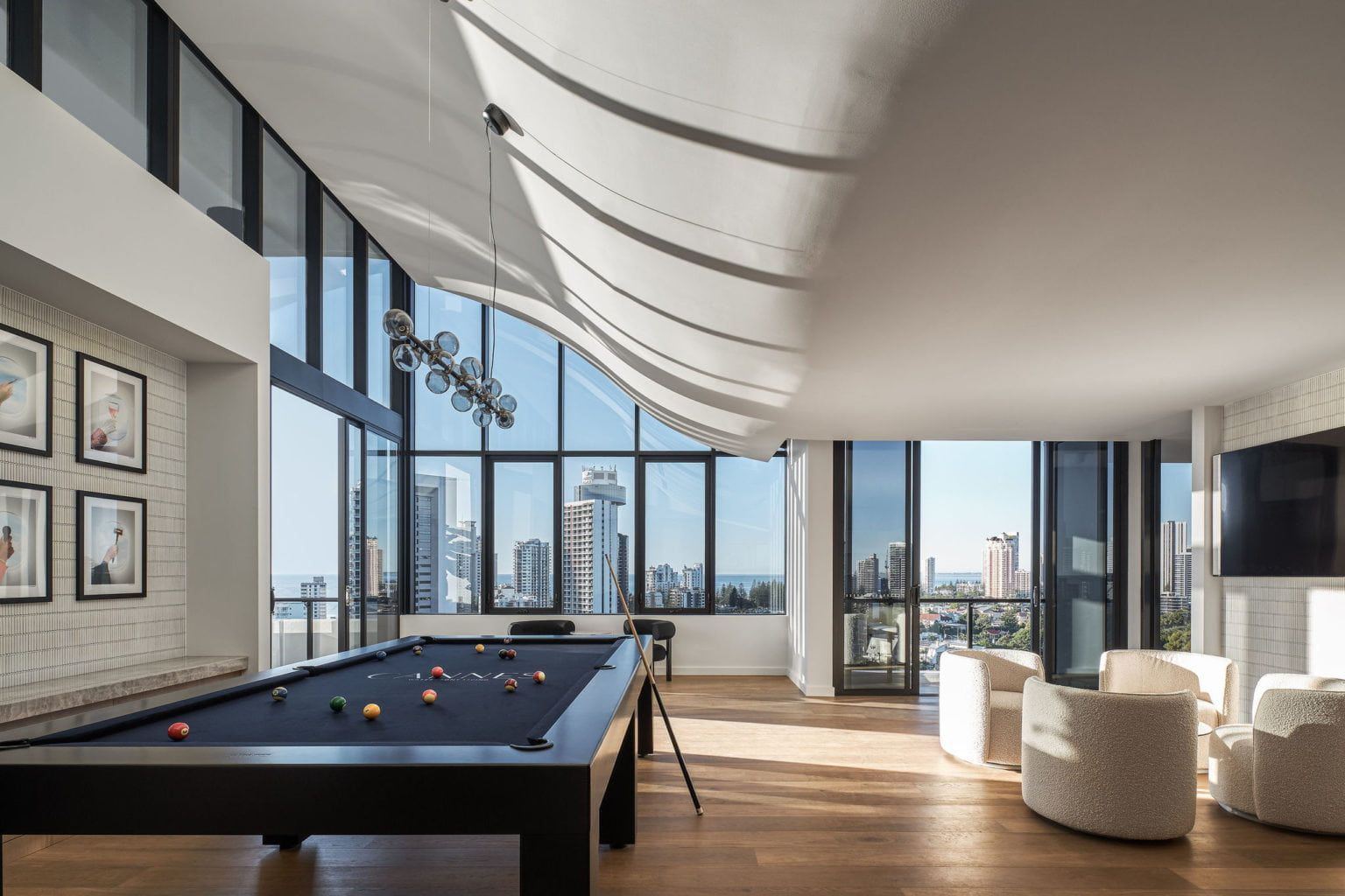 There Is A Pool Table In The Middle Of The Room