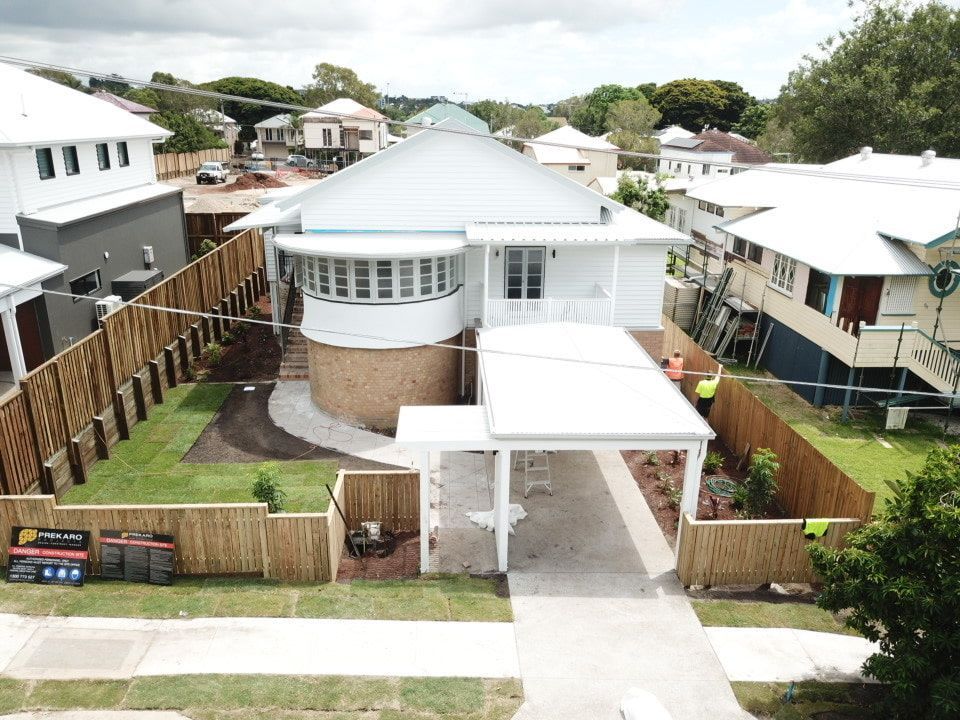 An Aerial View Of A House With A White Roof — Harrison Development Group In Surfers Paradise, QLD