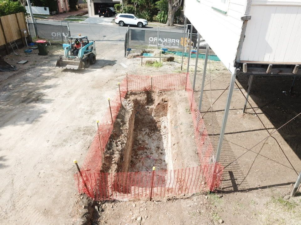 An Aerial View Of A Construction Site With A Fence Around It — Harrison Development Group In Surfers Paradise, QLD