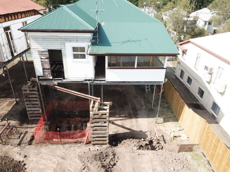 An Aerial View Of A House Under Construction With A Green Roof — Harrison Development Group In Surfers Paradise, QLD